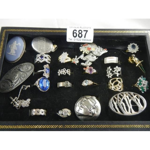 687 - A good lot of costume jewelry including rings etc.,