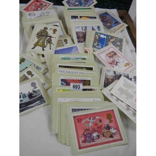 693 - A large lot of Royal Mail postage stamp postcards.