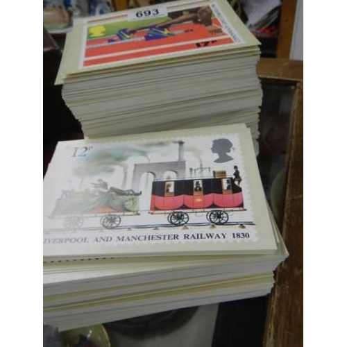 693 - A large lot of Royal Mail postage stamp postcards.