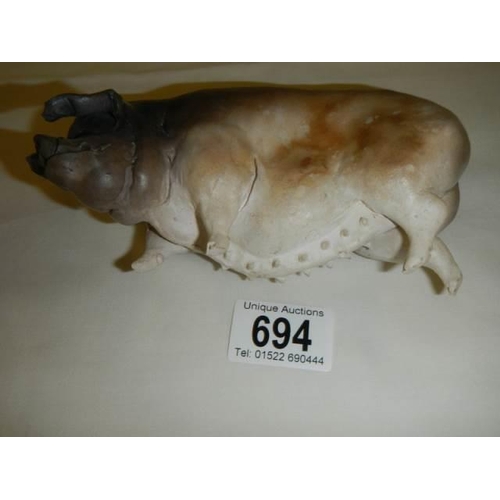 694 - A Studio pottery pig dated May 2002.