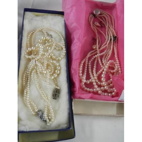 696 - Four good necklaces and two faux pearl necklaces.