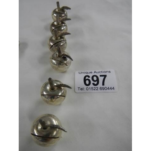 697 - A set of six apple shape place card holders.