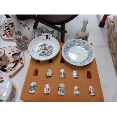 185 - A quantity of thimbles & 2 boxed Mason candlesticks etc.