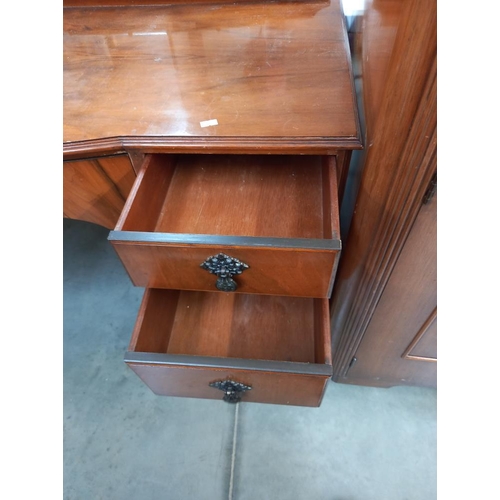 199 - A mahogany bedroom suite comprising triple mirror dressing table and two wardrobes, COLLECT ONLY