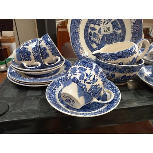 226 - An 20 piece blue and white willow pattern tea set COLLECT ONLY