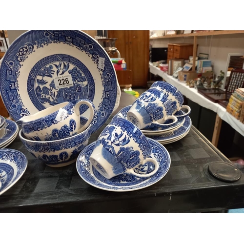 226 - An 20 piece blue and white willow pattern tea set COLLECT ONLY