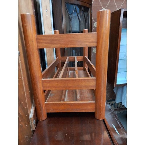 253 - A retro teak magazine rack COLLECT ONLY