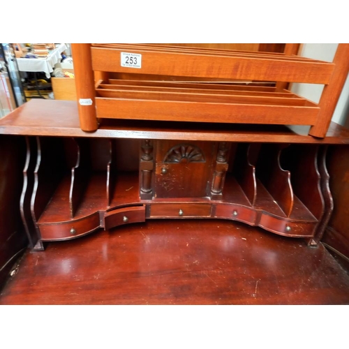 254 - A mahogany bureau with serpentine front COLLECT ONLY