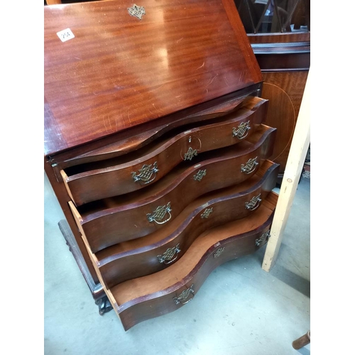 254 - A mahogany bureau with serpentine front COLLECT ONLY