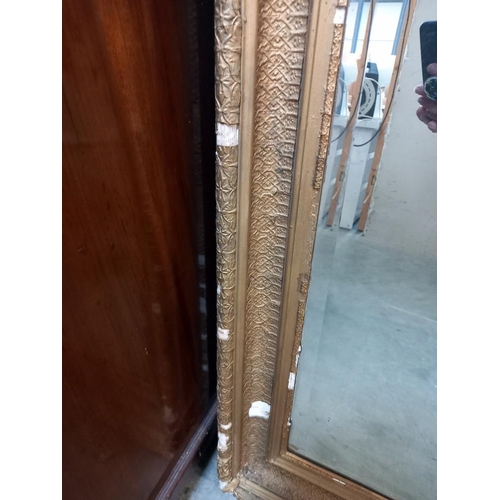 281 - A large gilt framed bevel edged mirror. COLLECT ONLY