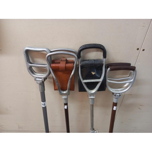 289 - 4 shooting/walking sticks COLLECT ONLY