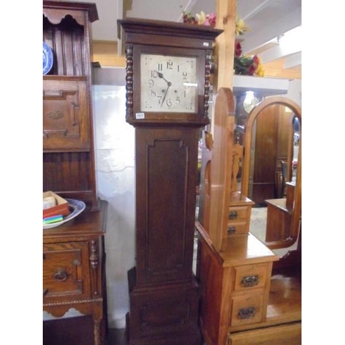 1511 - An oak cased eight day Grandfather clock, COLLECT ONLY.