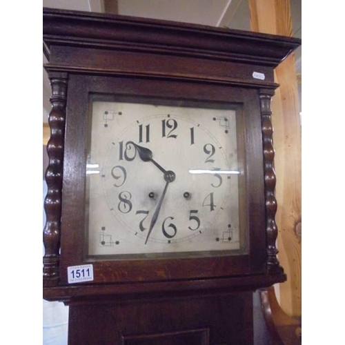 1511 - An oak cased eight day Grandfather clock, COLLECT ONLY.