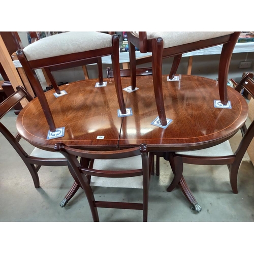 376 - A Dining table and six chairs. COLLECT ONLY