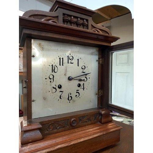 379 - An Edwardian oak mantle/bracket clock with silvered dial and a Trister 31 day mantle clock, all spri... 