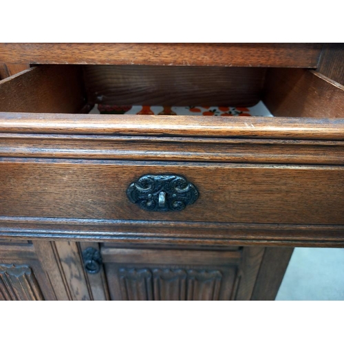 380 - A 1930/50's oak buffet with leaded glass panels COLLECT ONLY