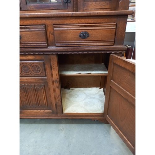 380 - A 1930/50's oak buffet with leaded glass panels COLLECT ONLY