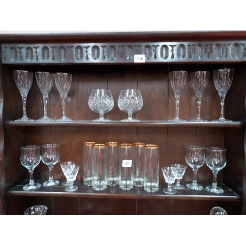 385 - A boxed French crystal glasses and 3 shelves of glassware etc COLLECT ONLY