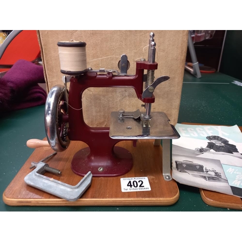 402 - A boxed Essex miniature sewing machine