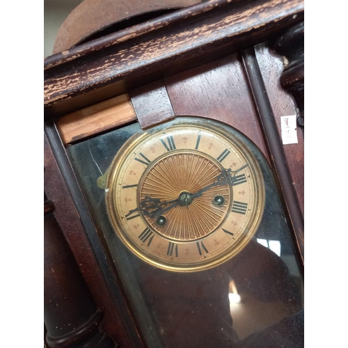 403 - A chain driven post office clock (no weights and pendulum) and Edwardian wall clock both as found an... 