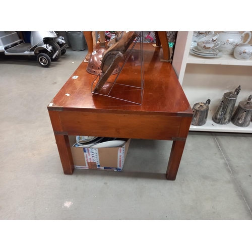 413 - A dark wood stained campaign coffee table with brass corners 122cm x 599cm x 41cm COLLECT ONLY