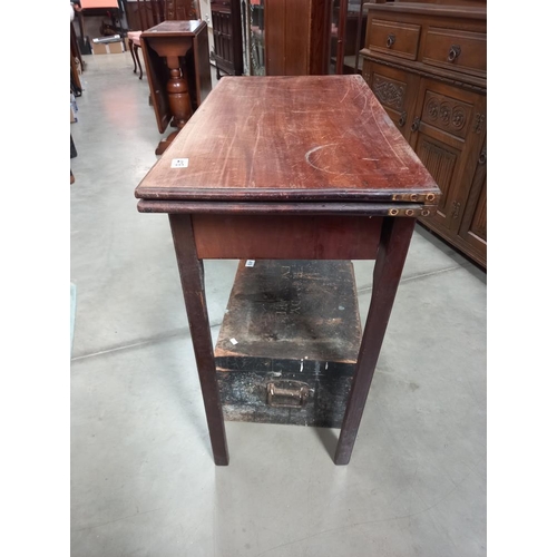 418 - An Edwardian mahogany fold over tea table