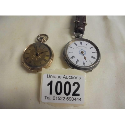 1002 - A silver fob watch a/f (no glass or minute hand) and a yellow metal fob watch.