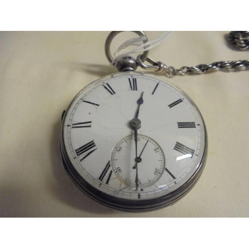 1003 - A silver pocket watch (not working) on a silver chain with silver fob and silver vesta (chain/fob/ve... 