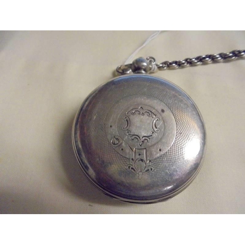 1003 - A silver pocket watch (not working) on a silver chain with silver fob and silver vesta (chain/fob/ve... 