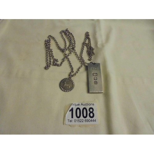 1008 - A silver ingot on a silver chain and a silver pendant on a silver chain, 54 grams.