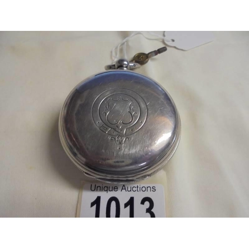 1013 - An English lever silver dial Halpern Manchester, No.89403 key wind pocket watch. In working order.