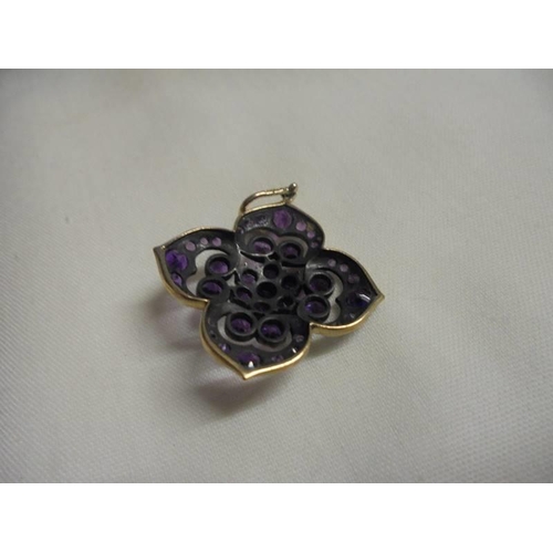 1030 - A 9ct gold amethyst pendant, 4.16 grams.