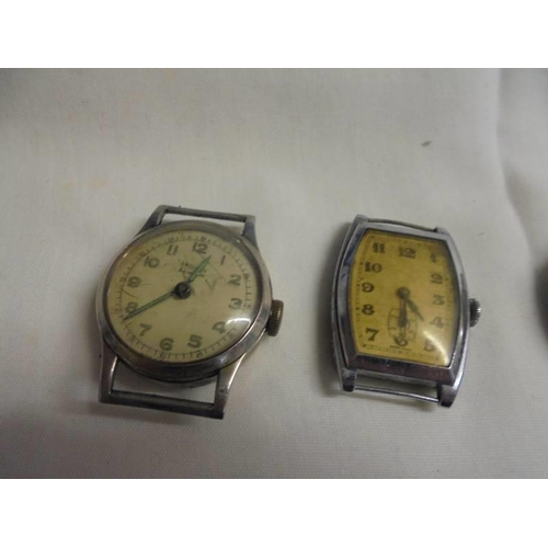 1045 - Six vintage watch heads for spare or repair,