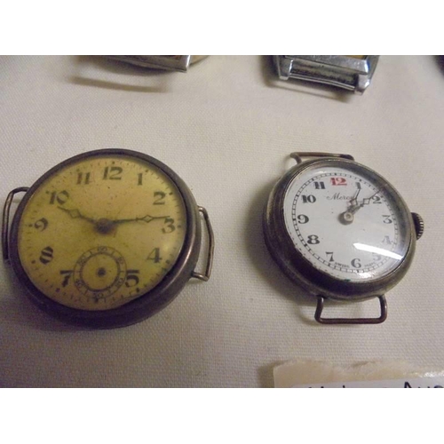 1045 - Six vintage watch heads for spare or repair,