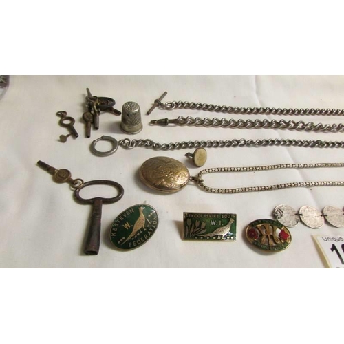 1048 - A quantity of watch chains, watch keys, badges etc.,