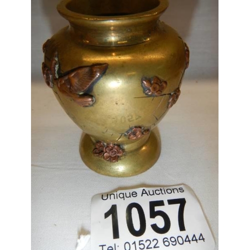 1057 - A late 19th century miniature brass and bronze vase with applied flowers, 6cm.