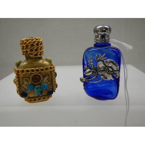 1059 - Five ornate perfume bottles including blue glass, Chinese etc.,