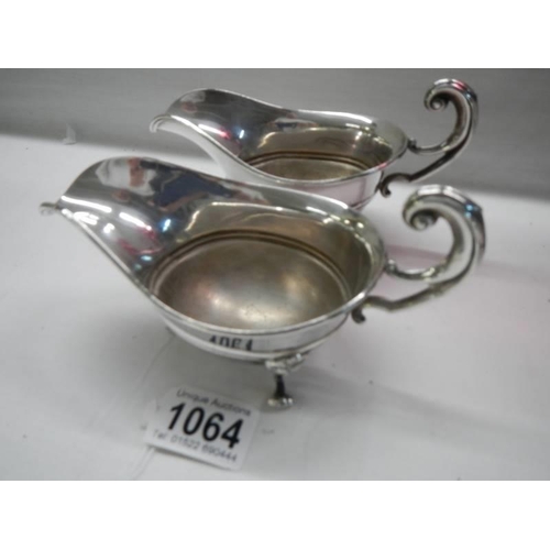 1064 - A pair of good quality silver plate sauce boats.