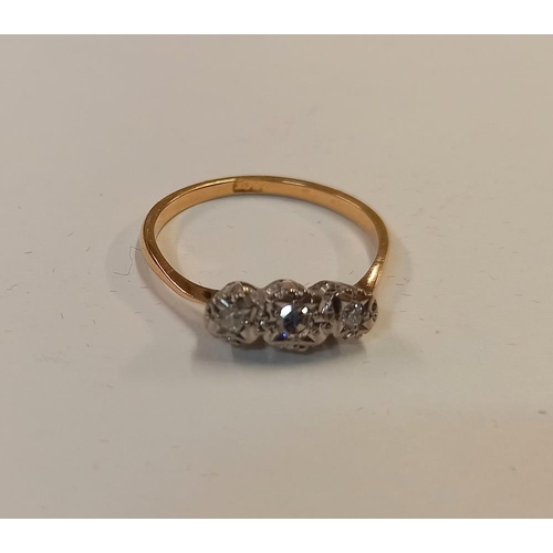 1060D - A circa 1940's diamond 3 stone ring stamped 18ct gold