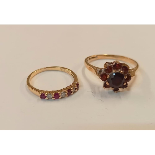 1060F - A ruby diamond band ring in 9ct gold together with a garnet cluster ring in 9ct gold