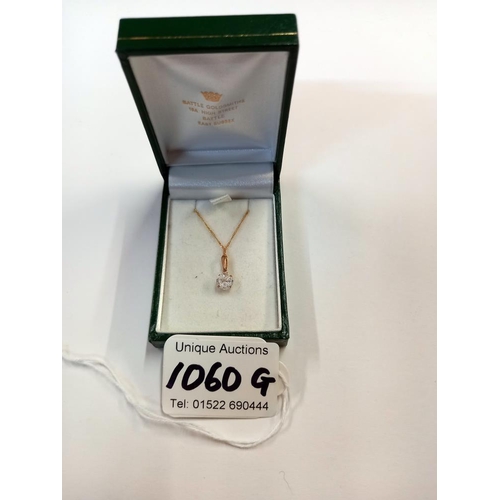 1060G - A 9ct gold pendant white stone set & 9ct chain