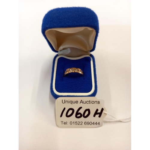 1060H - A white stone set band ring in 9ct gold hallmarked Birmingham (1994)