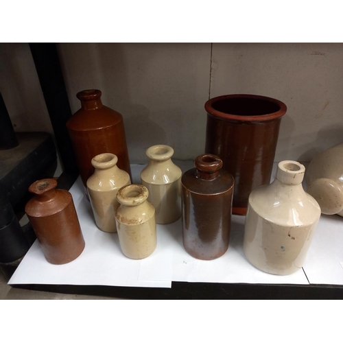 2409 - A quantity of stoneware bottles etc. COLLECT ONLY