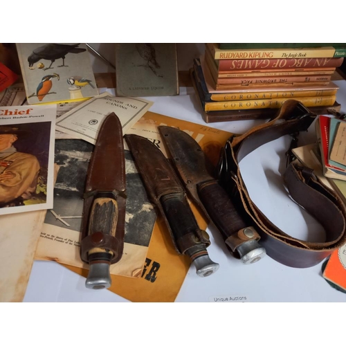 2436 - A quantity of vintage scouting books, Girl guide items, badges, belt and knives