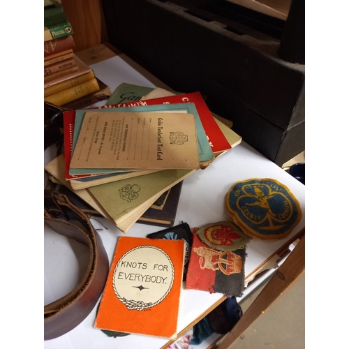 2436 - A quantity of vintage scouting books, Girl guide items, badges, belt and knives