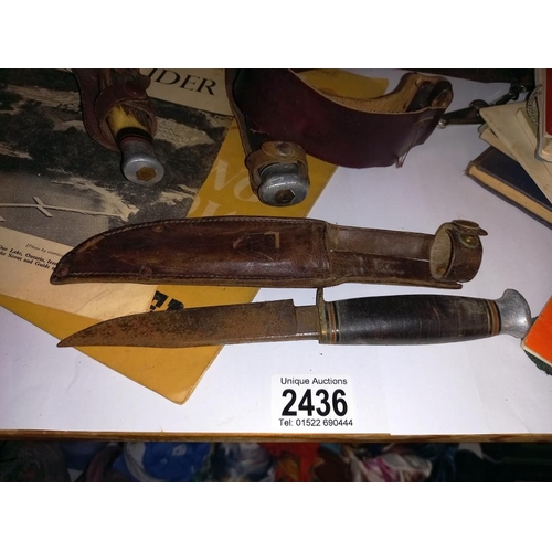 2436 - A quantity of vintage scouting books, Girl guide items, badges, belt and knives