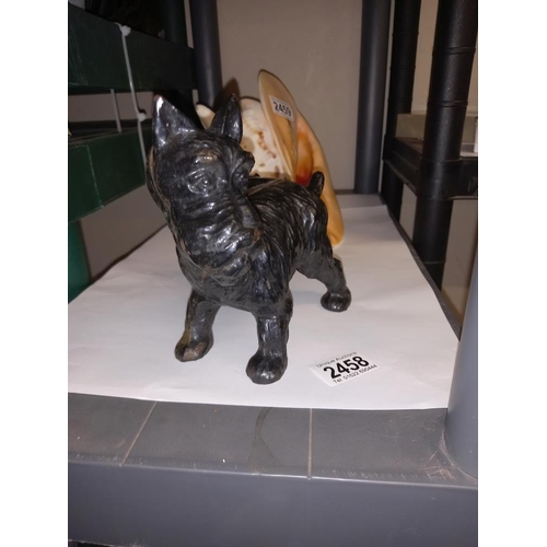 2458 - A cast iron dog door stop