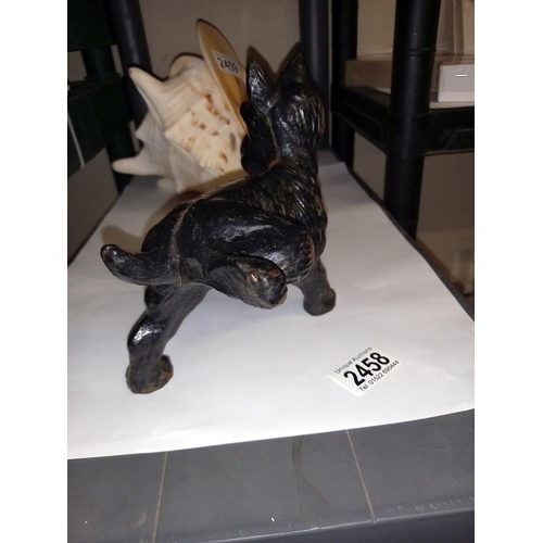 2458 - A cast iron dog door stop