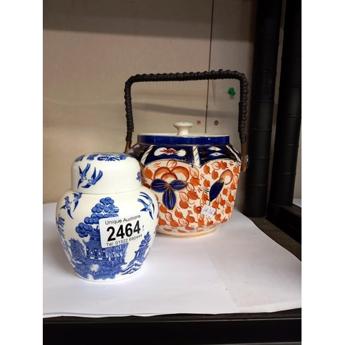 2464 - An octagon pottery Imari pattern biscuit barrel & a Coalport Blue Willow ginger jar COLLECT ONLY