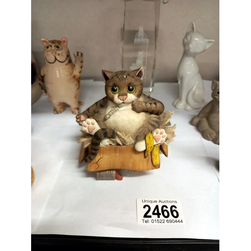 2466 - A collection of cat ornaments including Wade Tom & etched glass paperweight etc.